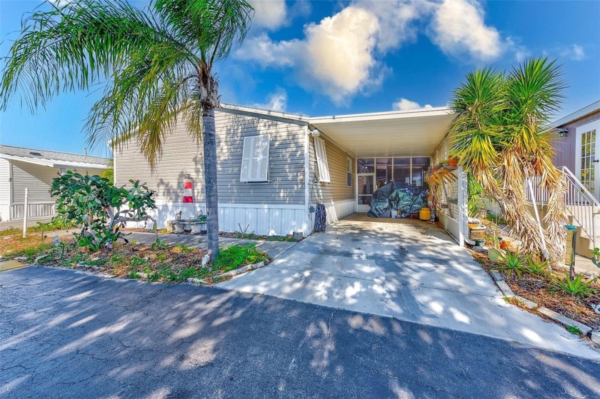 Welcome Home! Your tropical paradise awaits ... this beautiful - Beach Home for sale in Largo, Florida on Beachhouse.com