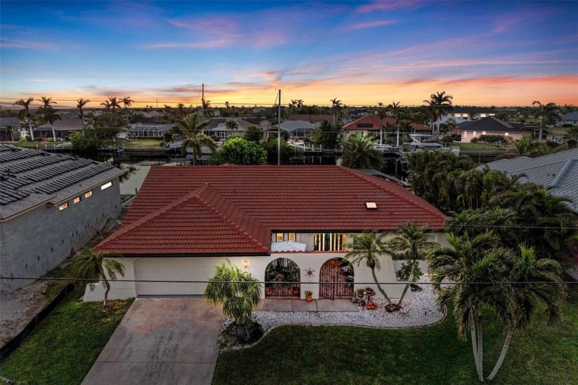 Captivating sunsets and excellent sailboat water access awaits - Beach Home for sale in Punta Gorda, Florida on Beachhouse.com