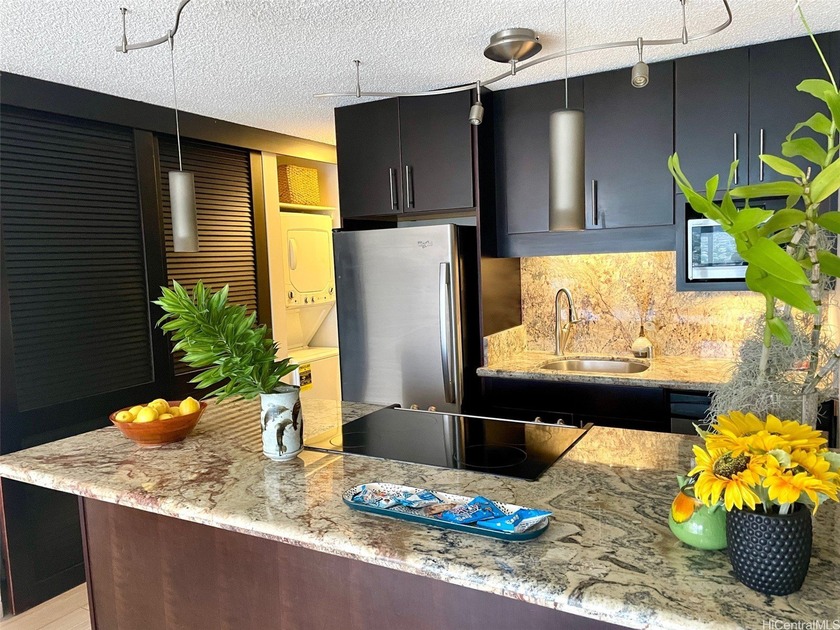 SUNDAY OPEN 2- 4 PM . This high-floor Canal House #1802 - Beach Condo for sale in Honolulu, Hawaii on Beachhouse.com