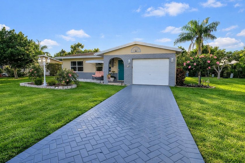 Discover this charming 2-bed, 1.5-bath home in the desirable - Beach Home for sale in Deerfield Beach, Florida on Beachhouse.com