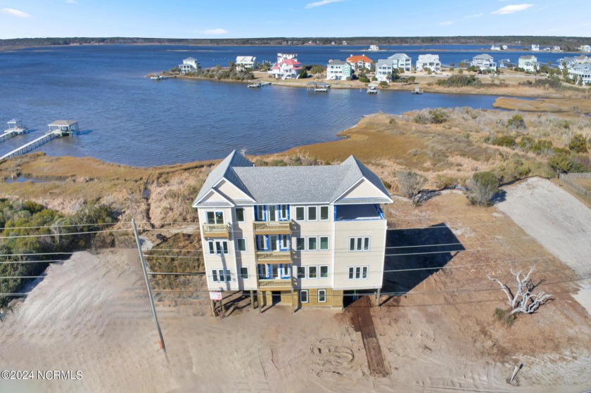 Introducing a coastal masterpiece! This luxury new construction - Beach Home for sale in North Topsail Beach, North Carolina on Beachhouse.com