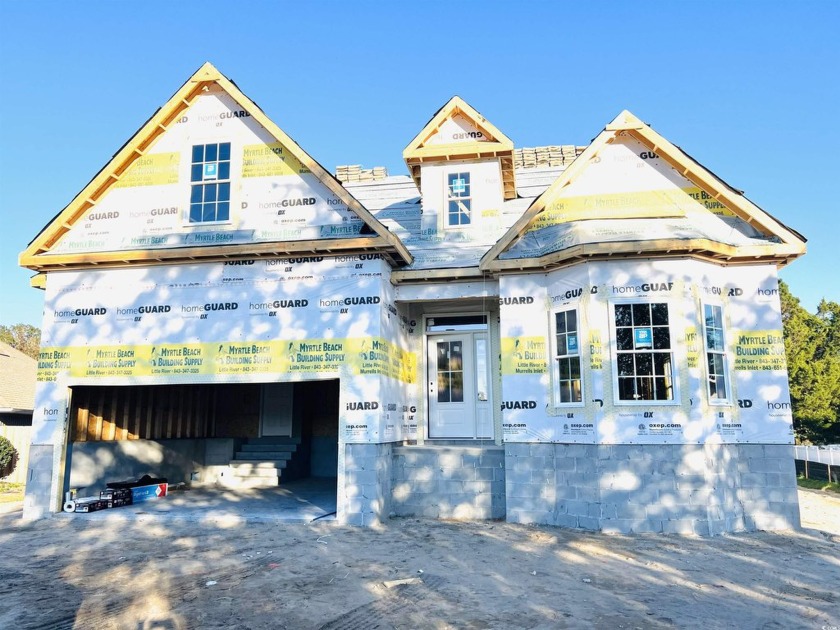 This beautiful 4-bedroom, 3-bathroom home in the Aberdeen Golf - Beach Home for sale in Longs, South Carolina on Beachhouse.com