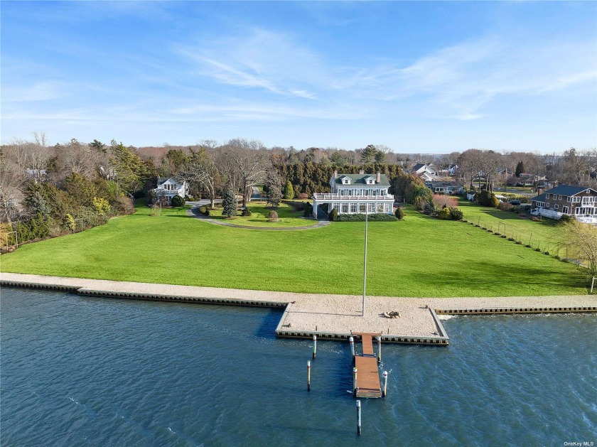Elegance Meets Modern Comfort in This Waterfront Compound Estate - Beach Home for sale in Center Moriches, New York on Beachhouse.com