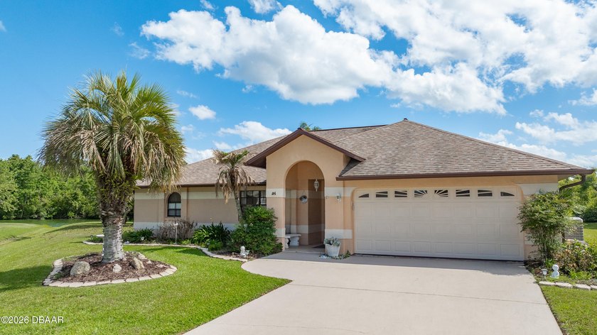 Tucked away in a serene setting, 24 Birchwood Place offers a - Beach Home for sale in Palm Coast, Florida on Beachhouse.com