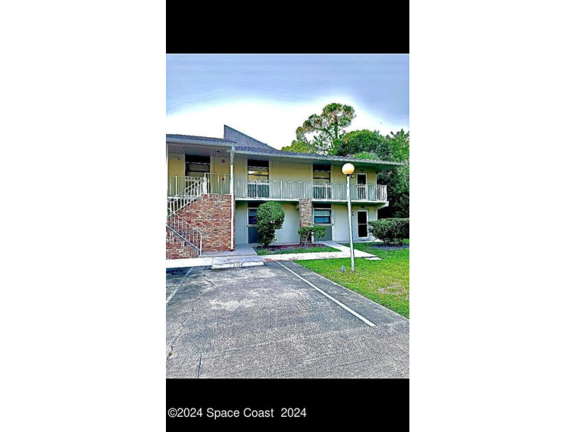 Situated in a sought-after golf course community, the tucked - Beach Condo for sale in Rockledge, Florida on Beachhouse.com