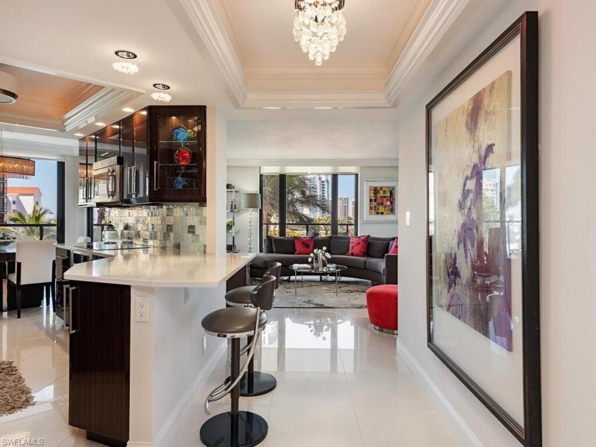 Beautifully remodeled and offered fully furnished, this 5th - Beach Condo for sale in Naples, Florida on Beachhouse.com