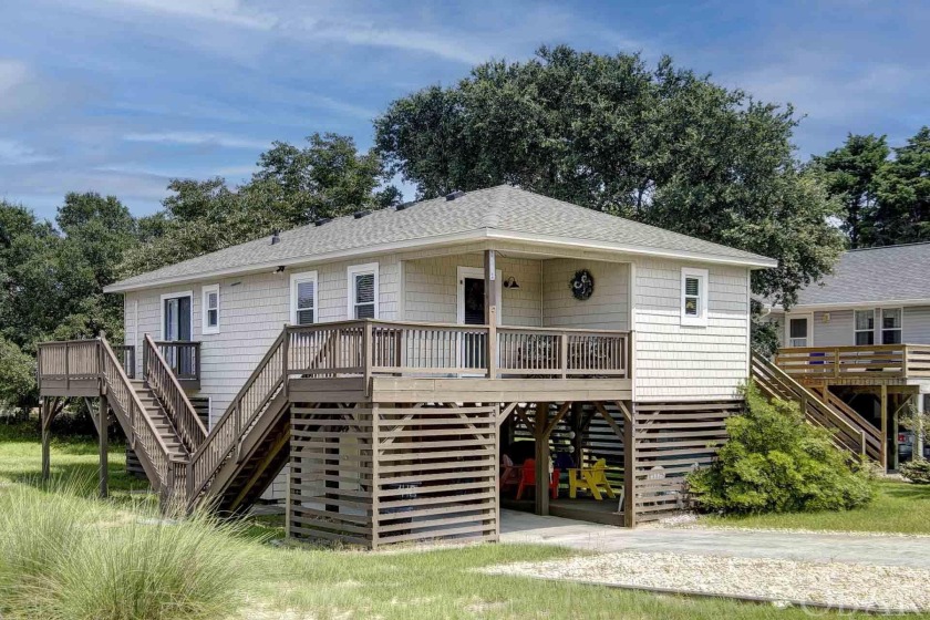 This updated jewel of a home is located 3 lots back from the - Beach Home for sale in Kill Devil Hills, North Carolina on Beachhouse.com