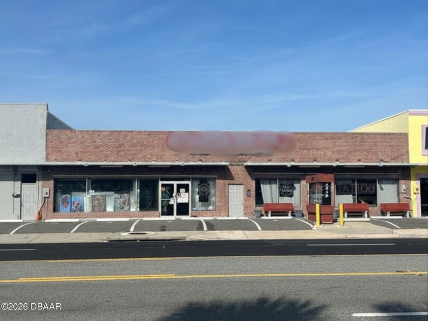 Versatile double retail storefront positioned on highly visible - Beach Commercial for sale in Daytona Beach Shores, Florida on Beachhouse.com