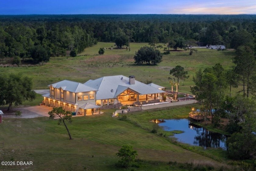 Discover an extraordinary gated estate nestled on 50 private - Beach Home for sale in New Smyrna Beach, Florida on Beachhouse.com