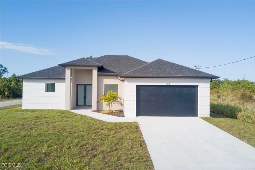 Welcome to this stunning new construction home, 3 bedrooms + a - Beach Home for sale in Lehigh Acres, Florida on Beachhouse.com