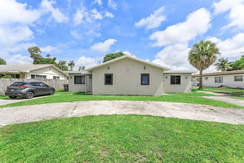 This income-producing duplex presents a fantastic opportunity - Beach Home for sale in West Palm Beach, Florida on Beachhouse.com