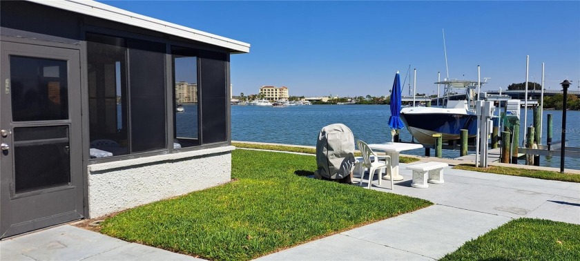 THIS FIRST FLOOR UNIT WITH WIDE OPEN WATERVIEWS AND PRIME BOAT - Beach Condo for sale in Madeira Beach, Florida on Beachhouse.com