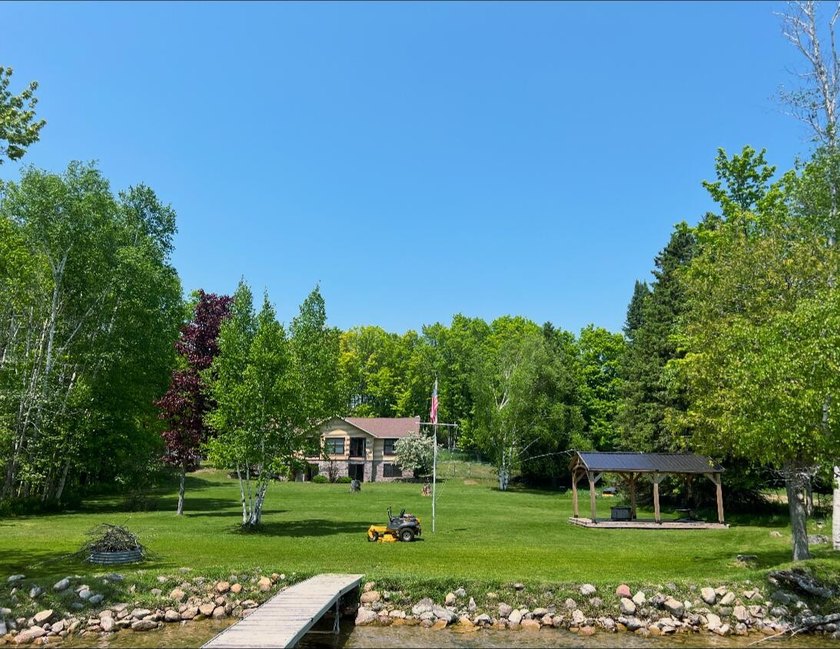 Welcome to this picturesque waterfront home between Curtis and - Beach Home for sale in Mcmillan, Michigan on Beachhouse.com