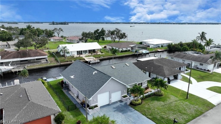 BEST PRICED CANAL HOME on the market! FABULOUS LOCATION on canal - Beach Home for sale in North Fort Myers, Florida on Beachhouse.com