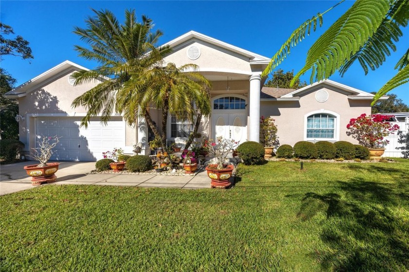 Welcome to the custom-built, lakefront home in the Kapok Terrace - Beach Home for sale in Clearwater, Florida on Beachhouse.com