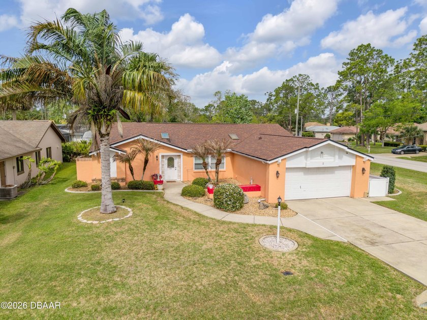 Welcome to this charming single-family home on a desirable - Beach Home for sale in Palm Coast, Florida on Beachhouse.com