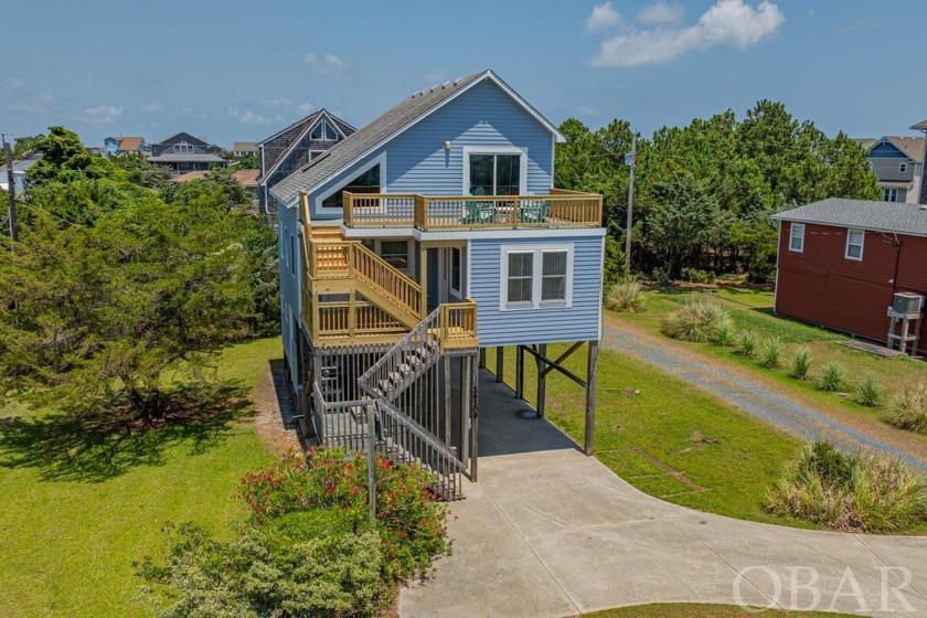 Welcome to 26209 Bluebeard Road, nestled in the highly - Beach Home for sale in Salvo, North Carolina on Beachhouse.com