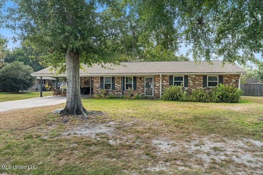 This beautifully updated 3-bedroom, 2-bath home is located in - Beach Home for sale in Long Beach, Mississippi on Beachhouse.com