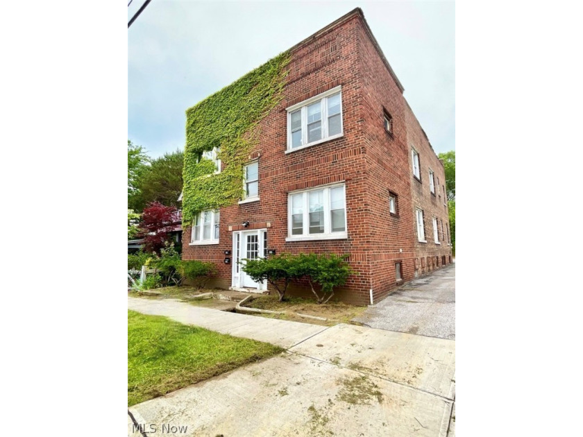 Great opportunity to own a 4 unit brick building right in the - Beach Home for sale in Cleveland, Ohio on Beachhouse.com