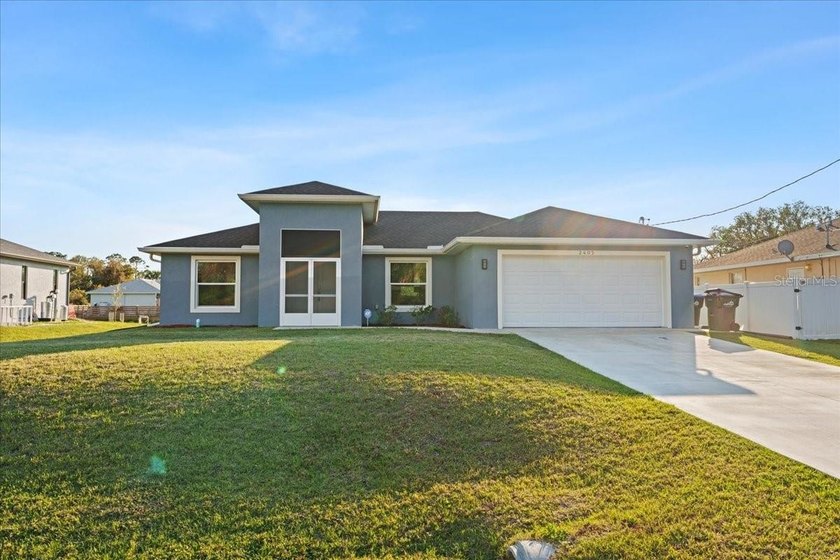 From the moment you step through the double-door entry, you're - Beach Home for sale in North Port, Florida on Beachhouse.com