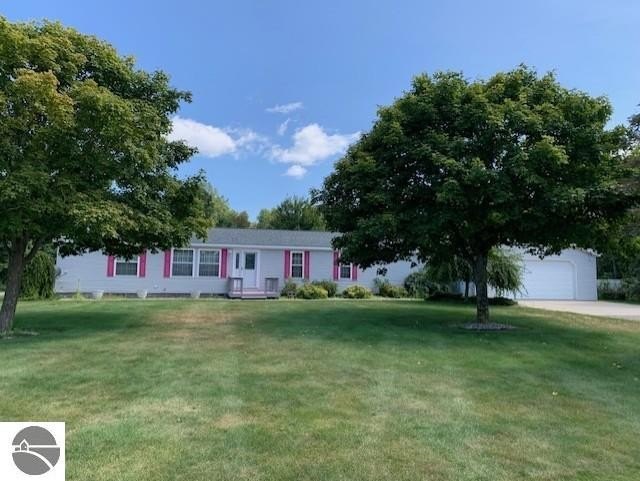 Lovely country setting on 1.35 acres with a nice sense of - Beach Home for sale in Tawas City, Michigan on Beachhouse.com