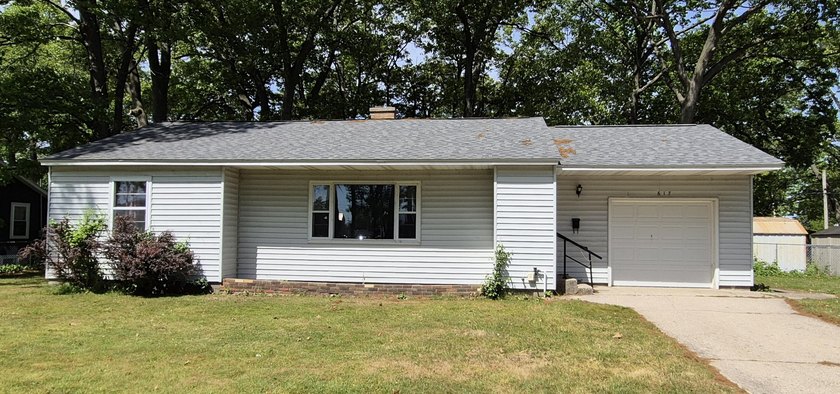 Discover the charm of this classic 3 bedroom ranch home located - Beach Home for sale in Muskegon, Michigan on Beachhouse.com