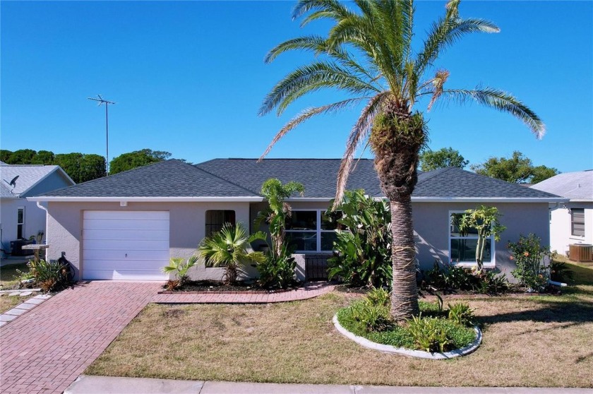 Welcome to 1029 Fuchsia Dr, Holiday, FL! This charming 2-bedroom - Beach Home for sale in Holiday, Florida on Beachhouse.com