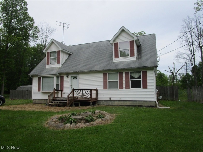 This cute Cape Cod is in a fantastic location...just minutes - Beach Home for sale in Geneva, Ohio on Beachhouse.com