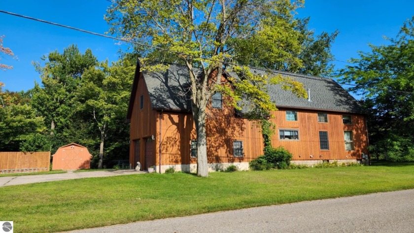 Own a piece of East Tawas History.  Built in 1887 as a Swedish - Beach Home for sale in East Tawas, Michigan on Beachhouse.com