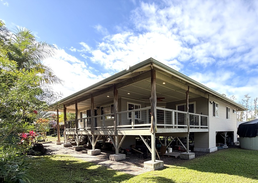 Nestled in the desirable upper section of Ainaloa, this inviting - Beach Home for sale in Pahoa, Hawaii on Beachhouse.com