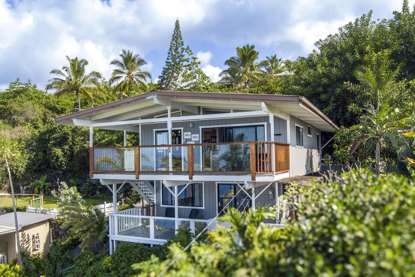 Enjoy spectacular ocean views from both decks of this 3 bedroom - Beach Home for sale in Captain Cook, Hawaii on Beachhouse.com
