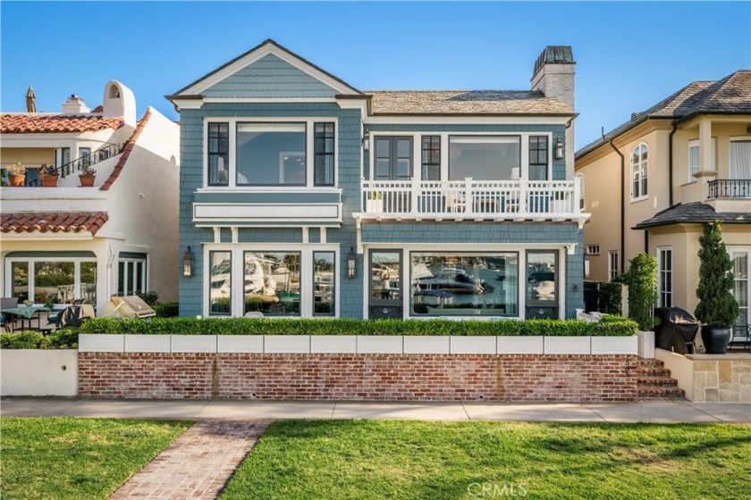 Occupying a forty-foot-wide waterfront lot in a premier and - Beach Home for sale in Newport Beach, California on Beachhouse.com