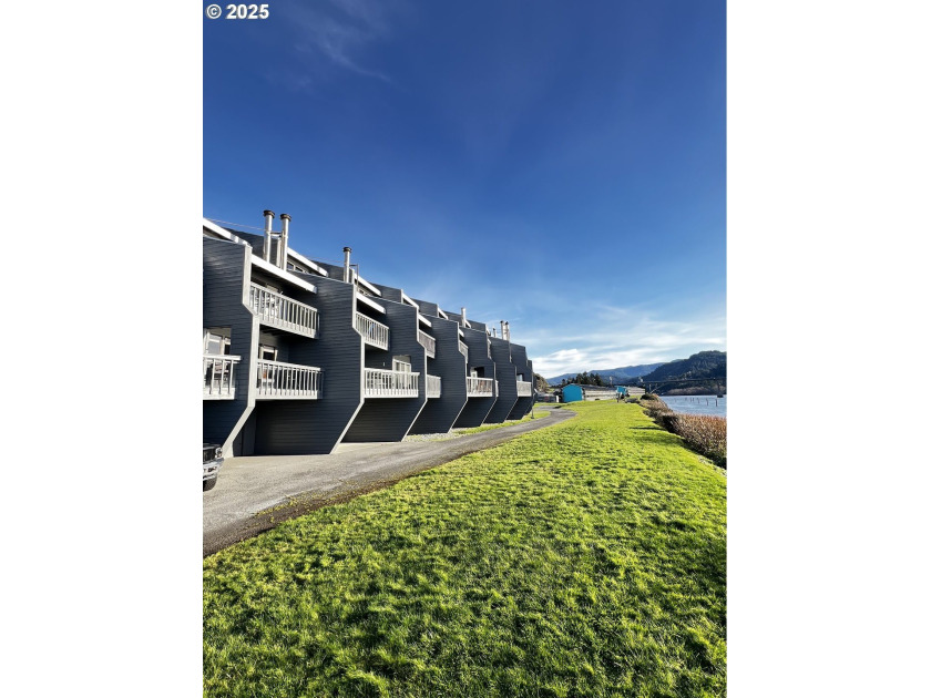 Enjoy stunning riverfront living with ocean views from this - Beach Condo for sale in Gold Beach, Oregon on Beachhouse.com