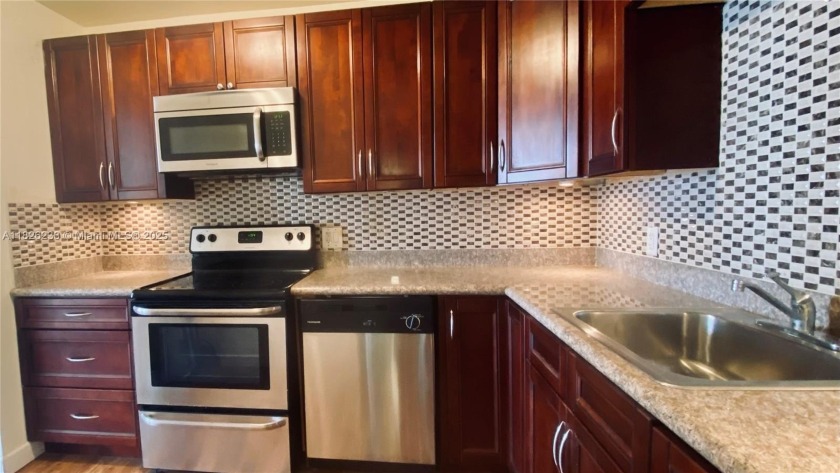 Brand New Central AC.  Brand New Refrigerator. Brand New PVC - Beach Condo for sale in North Miami Beach, Florida on Beachhouse.com