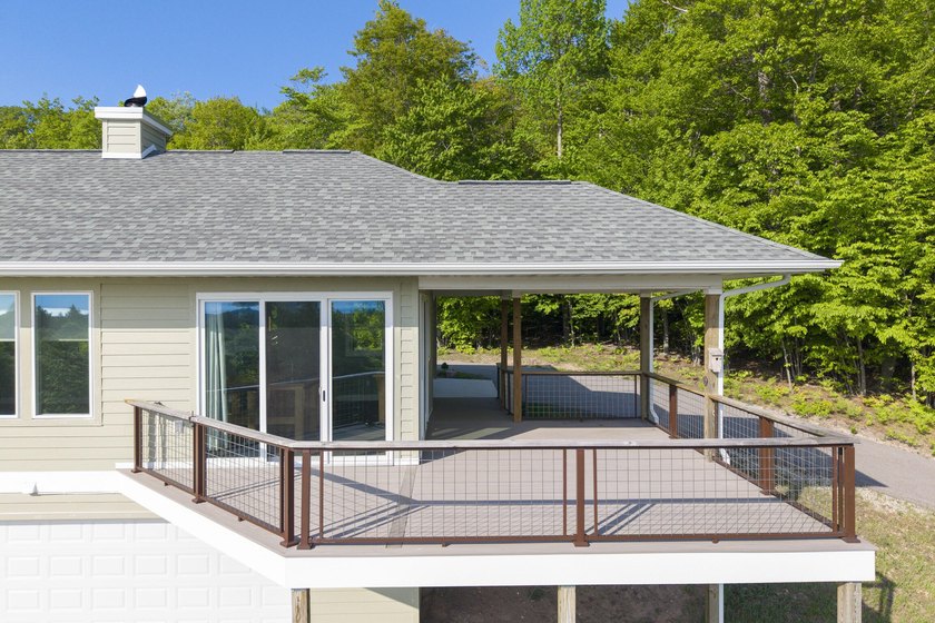 Lake Michigan Views from Every Room! Perched in the scenic hills - Beach Home for sale in Onekama, Michigan on Beachhouse.com