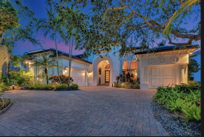 This seldom available largest ranch Mallorca model is truly a - Beach Home for sale in Palm Beach Gardens, Florida on Beachhouse.com