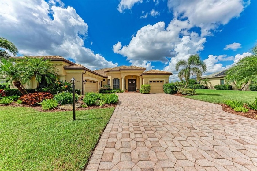 Exquisite lakefront estate on a half acre lot nestled in Country - Beach Home for sale in Bradenton, Florida on Beachhouse.com