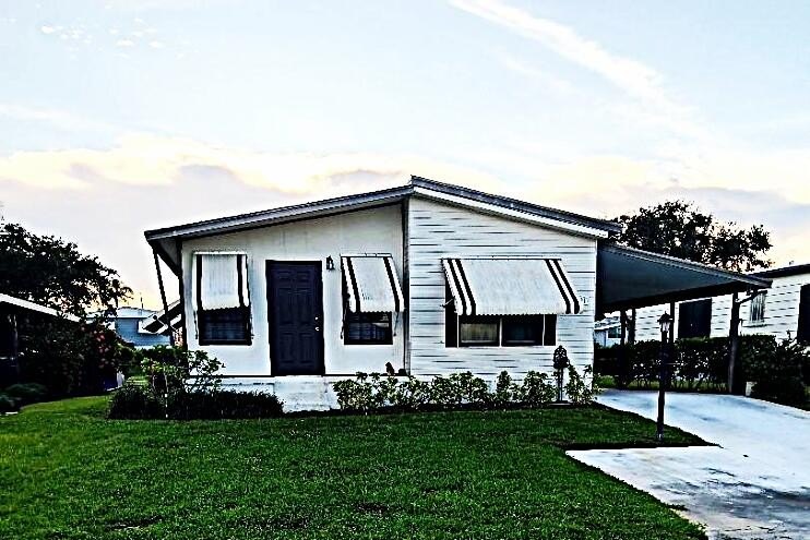 Desirable 55+ community where you own the land, and pets are - Beach Home for sale in Hobe Sound, Florida on Beachhouse.com