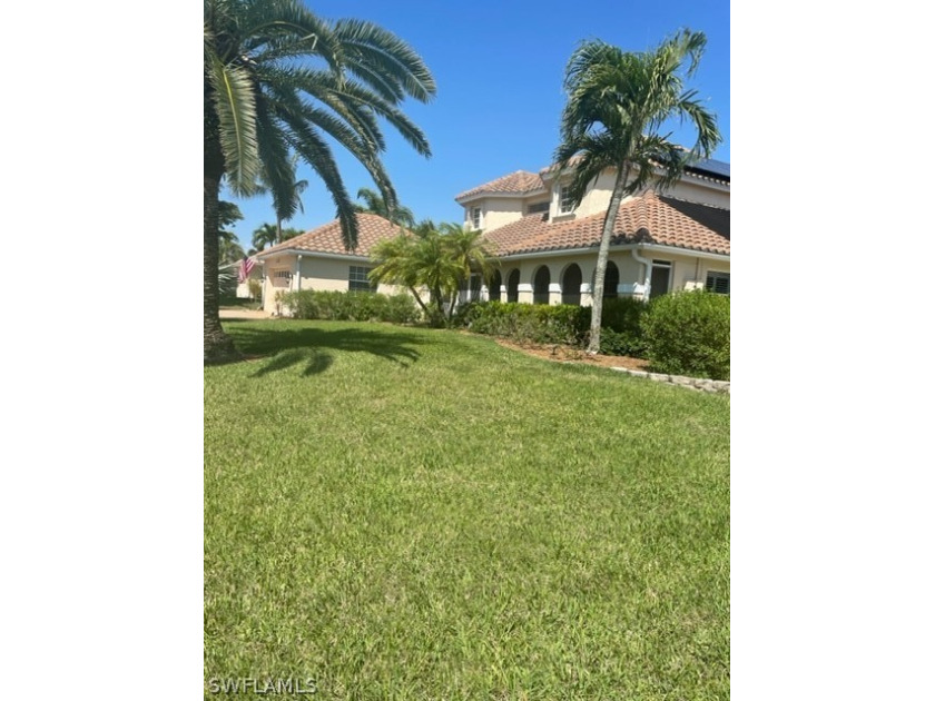 Beautiful home with panoramic views set on an oversized lot in - Beach Home for sale in Cape Coral, Florida on Beachhouse.com