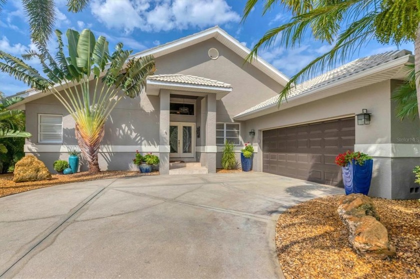 Welcome to Cape Haze Windward!  This exceptional 3/2/2 home is - Beach Home for sale in Placida, Florida on Beachhouse.com