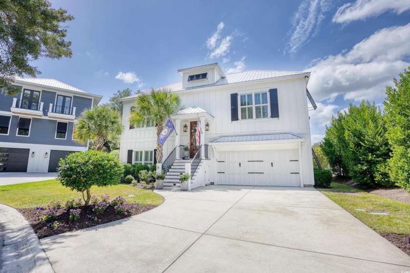 Welcome to 14 Flaggpoint Lane. This exquisite home is located in - Beach Home for sale in Murrells Inlet, South Carolina on Beachhouse.com