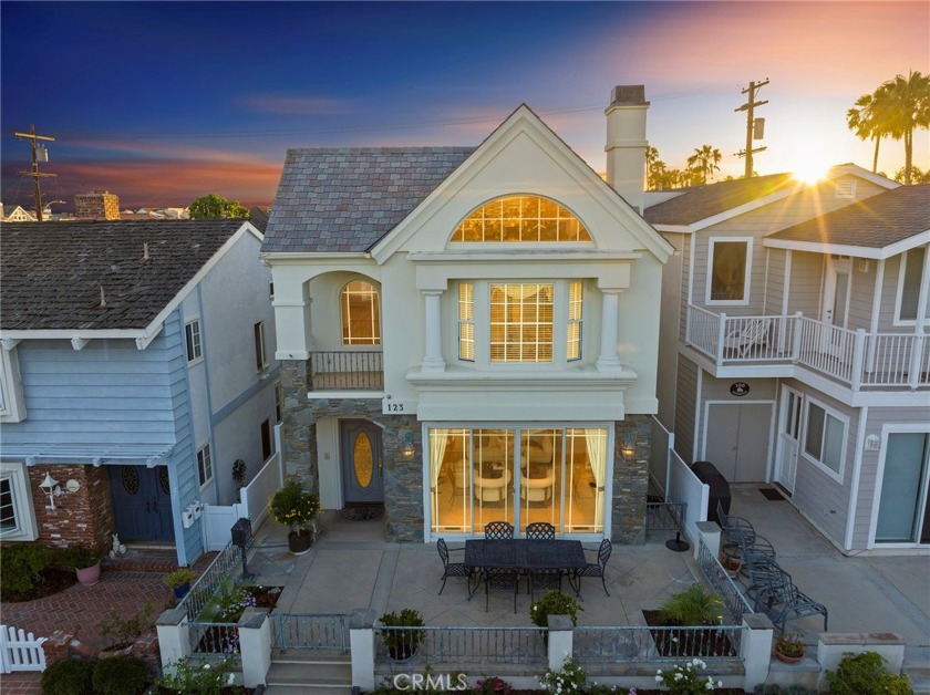 Discover coastal living at its finest in this charming Balboa - Beach Home for sale in Newport Beach, California on Beachhouse.com