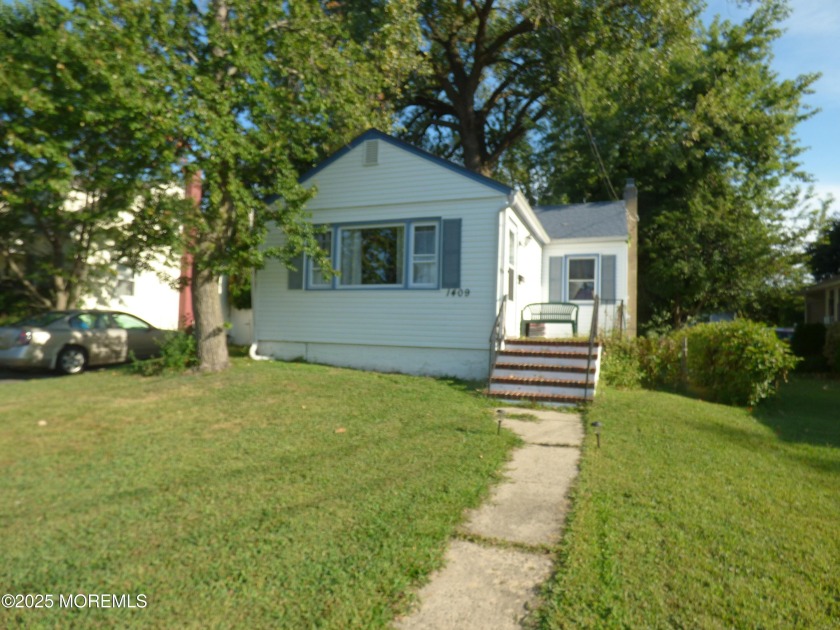 Great chance to make this one your new address! Situated on a - Beach Home for sale in Neptune, New Jersey on Beachhouse.com