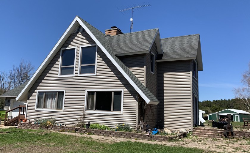 Lovely home with 4 bedrooms and 2.5 baths, basement, & attached - Beach Home for sale in Mcmillan, Michigan on Beachhouse.com