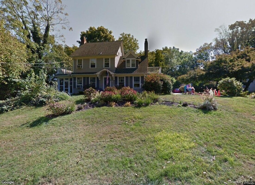 Welcome to this charming colonial offering timeless elegance and - Beach Home for sale in Centerport, New York on Beachhouse.com