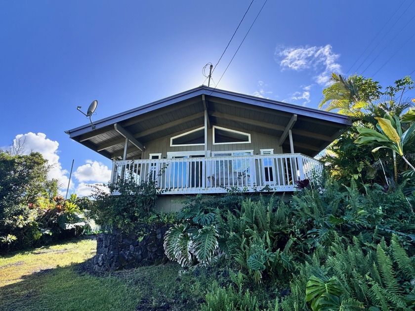 Welcome to this charming 2-bedroom, 1-bath home in Ainaloa, set - Beach Home for sale in Pahoa, Hawaii on Beachhouse.com