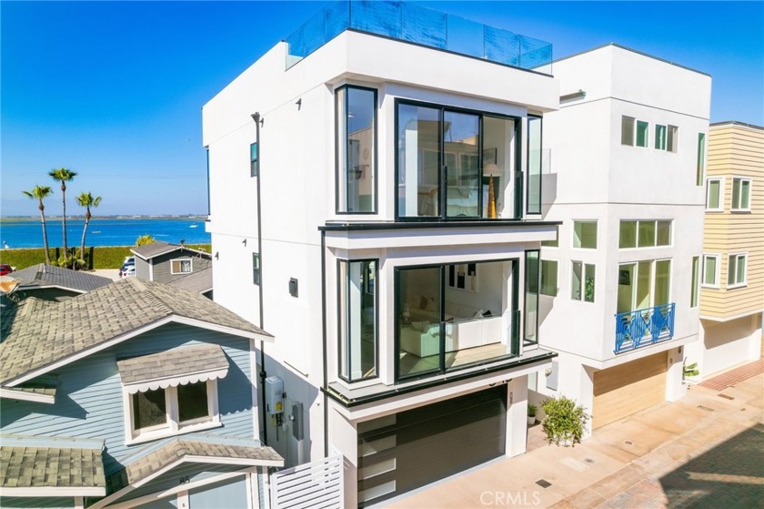 Improved price for a brand new modern luxury three-story home - Beach Home for sale in Seal Beach, California on Beachhouse.com