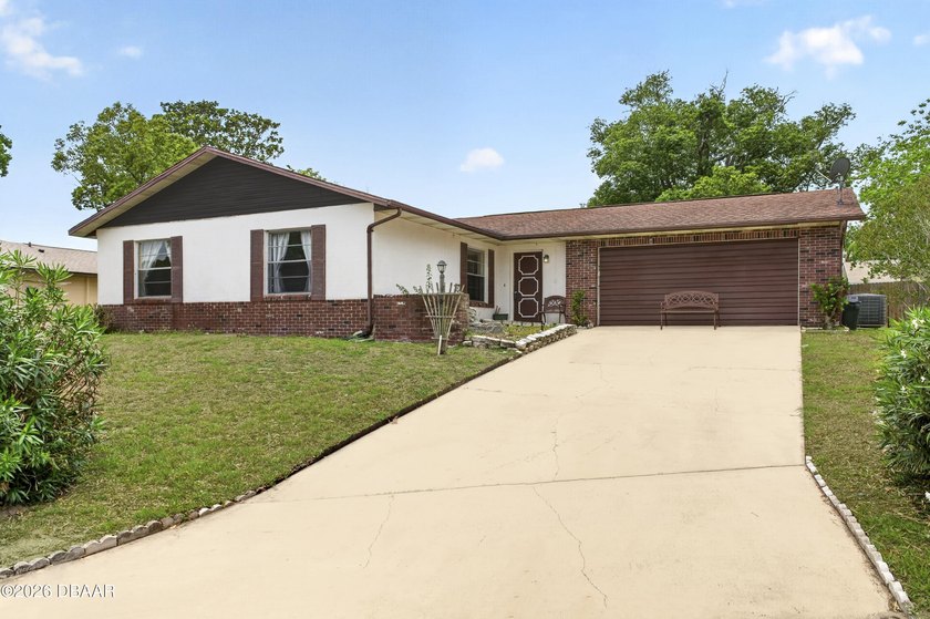 Located on a quiet cul-de-sac street in Port Orange, this - Beach Home for sale in Port Orange, Florida on Beachhouse.com
