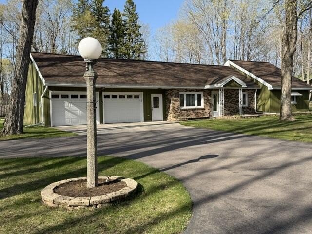 Any Golf Lover will love the location of this impeccably - Beach Home for sale in Munising, Michigan on Beachhouse.com