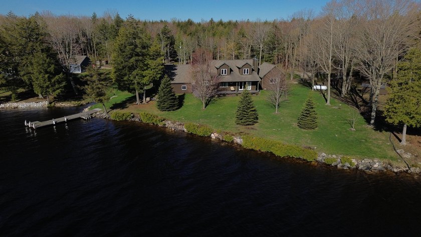 See ASTOUNDING home on Caribou Lake, over 800 acre lake, outside - Beach Home for sale in De Tour Village, Michigan on Beachhouse.com